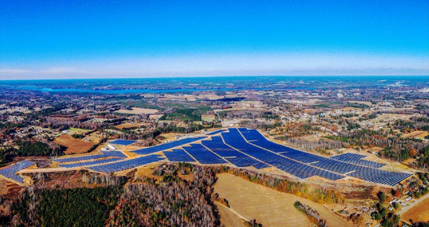 Solar panel arrays across a hillside